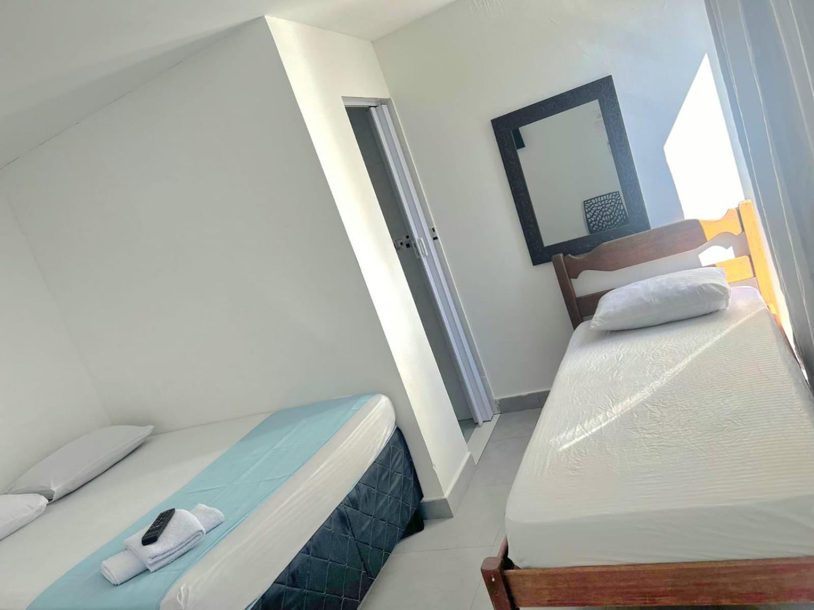 Quarto Triplo com Varanda